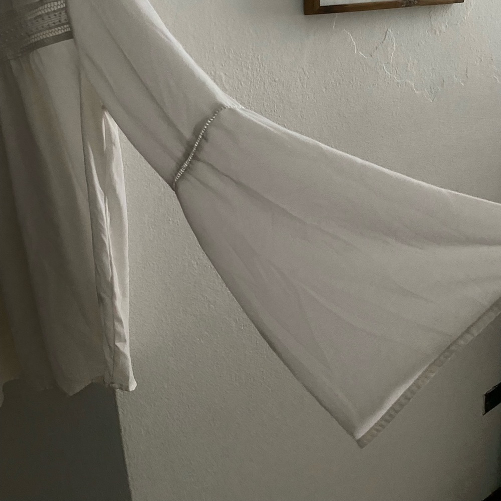white, bell sleeves